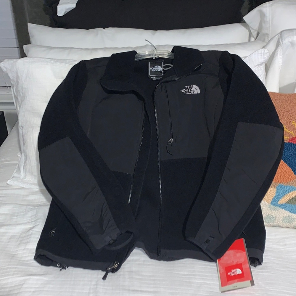 Hi. Brand new Black The North Face Jacket with the tags. In excellent condition